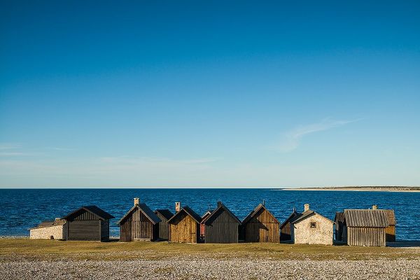Bibikow, Walter 아티스트의 Sweden-Faro Island-Kursviken-coastal farmers fishing shacks-sunset작품입니다.
